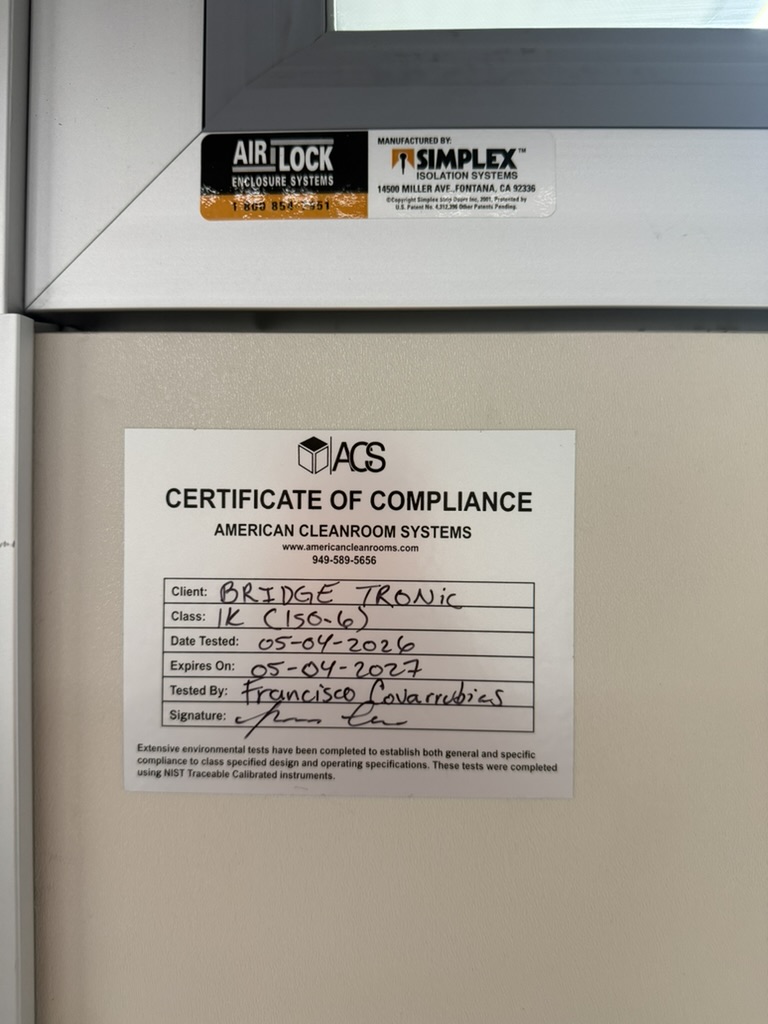 ACS Certificate of Compliance posted on the BTG Engineering cleanroom door